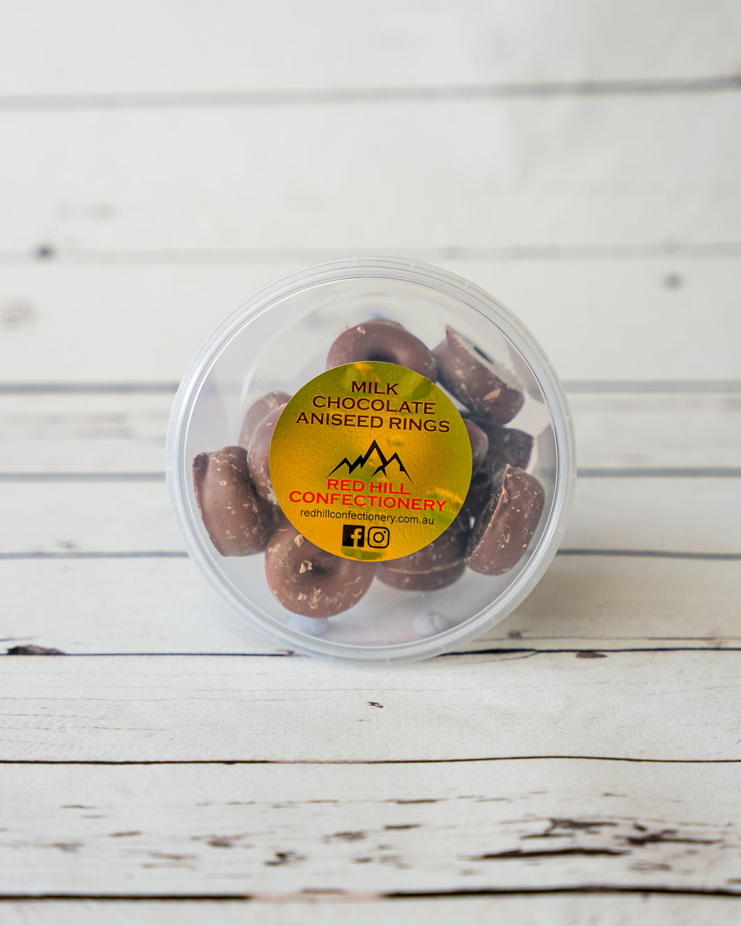 Red Hill Confectionery - Milk Chocolate Coated Aniseed Rings 200g Tub